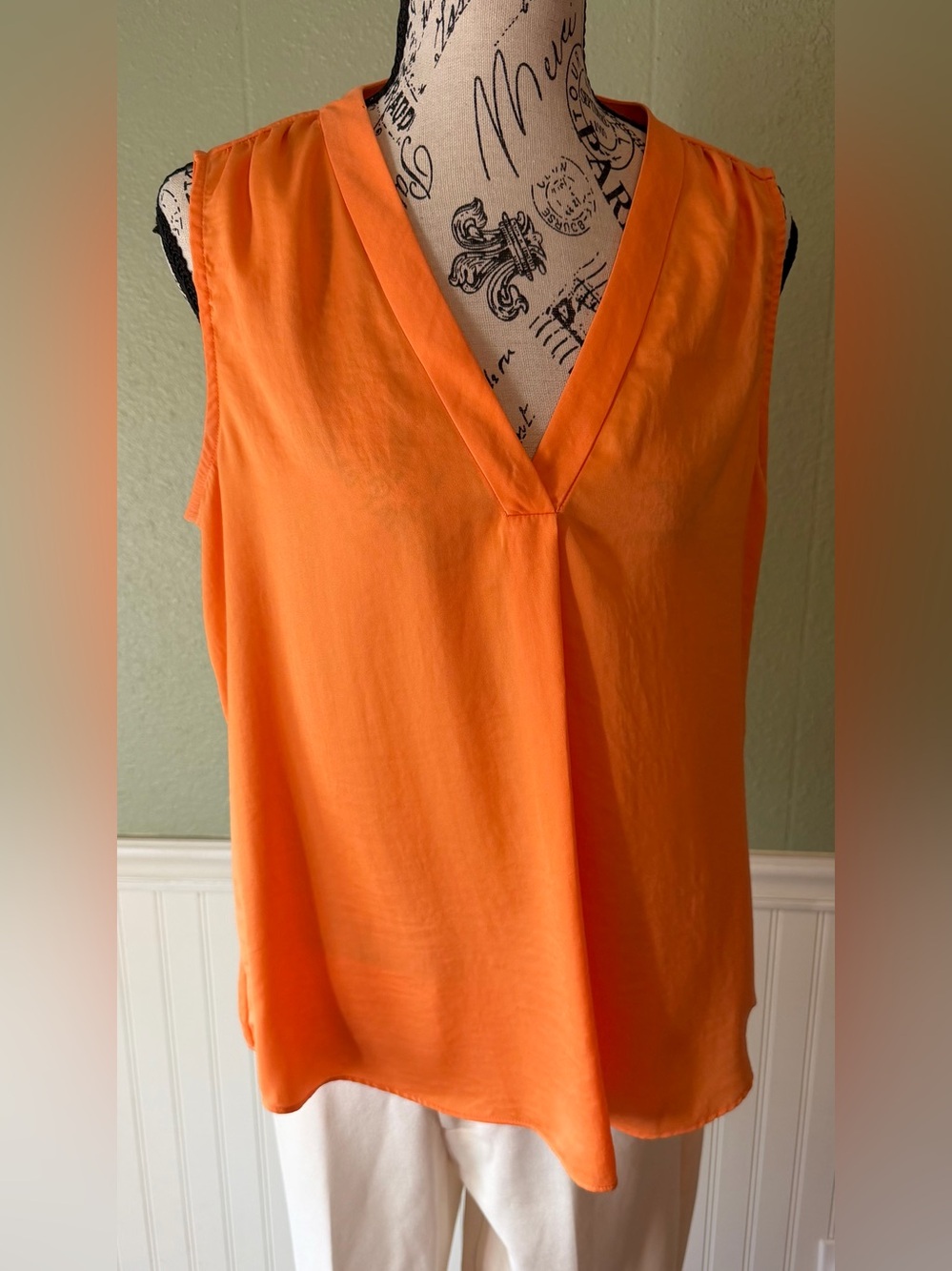 Vince Comuto V-Neck Women’s Top in Dream-sickle Orange.